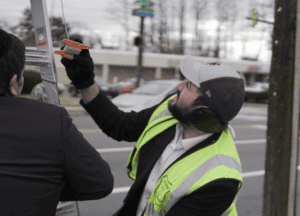 Man looking up to check eruv